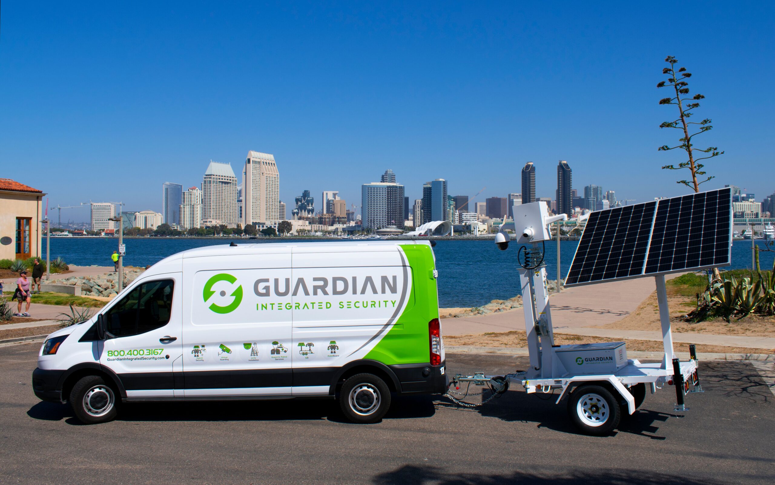 Security camera overlooking the gated entrance of a California apartment complex at night