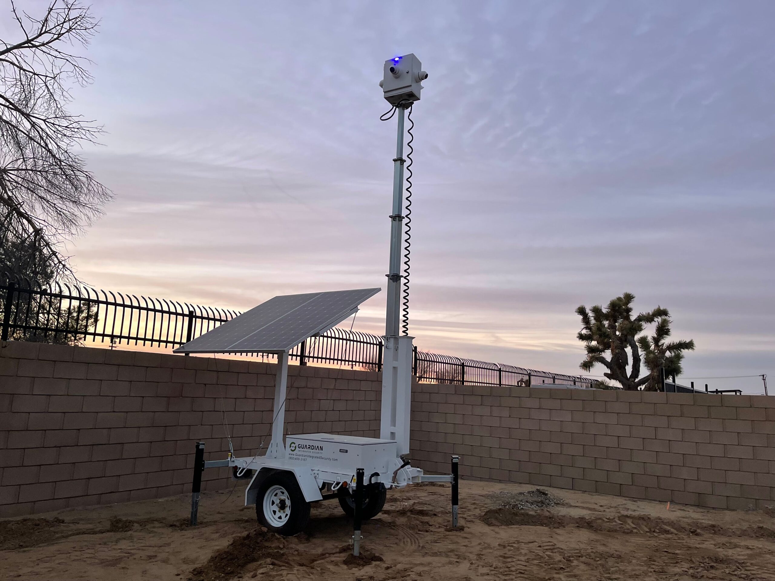 Construction site theft prevention California mobile surveillance trailer protecting equipment at night
