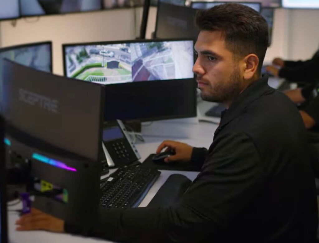 Security camera footage capturing catalytic converter theft at auto lot