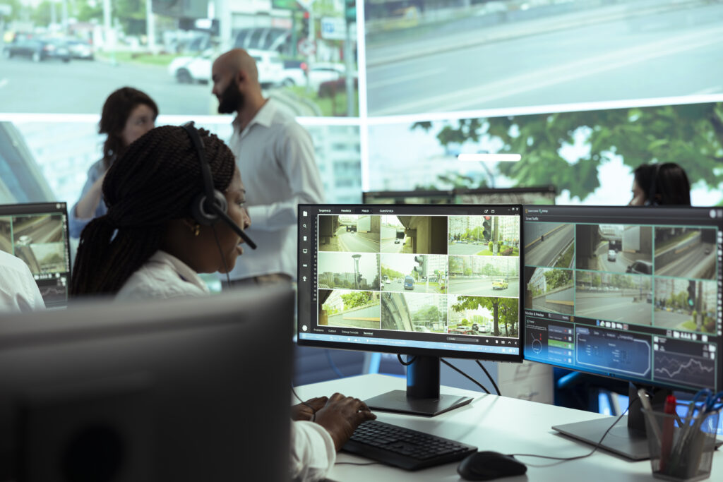 Commercial CCTV monitoring room with multiple camera feeds on display