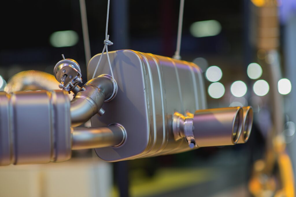 Security camera footage capturing catalytic converter theft at auto lot