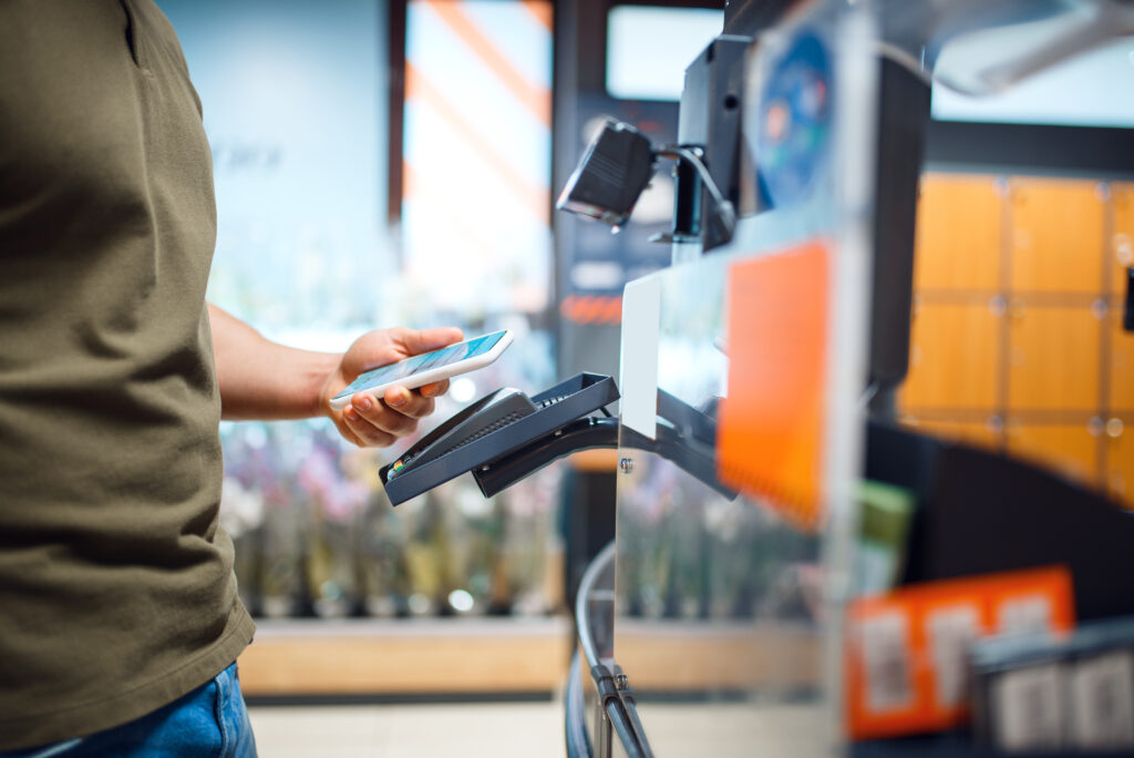 Split-screen showing security camera feed and guard patrolling retail floor