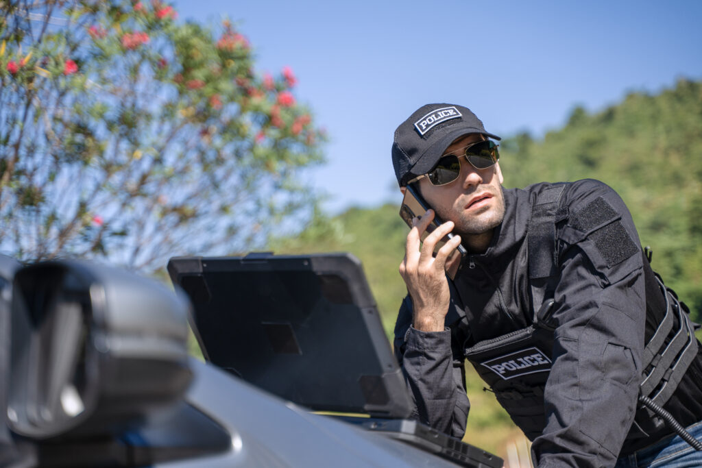 Vehicle patrol officer using dashboard camera and GPS tracking system